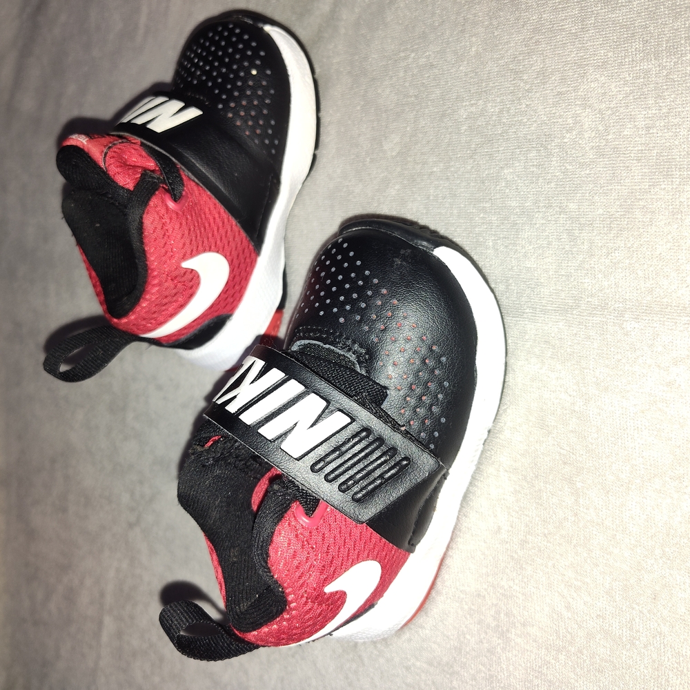 Nike Black and Red Sneakers with Slip-On Design
